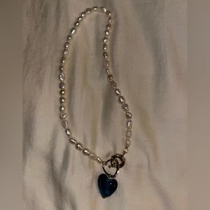 Chunky pearl rope necklace with blue heart pendant